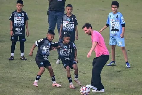 Messi played football with children at a stadium in Delhi